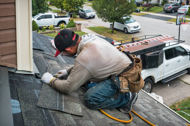 Professional Roofing technician working in Harvey, MI